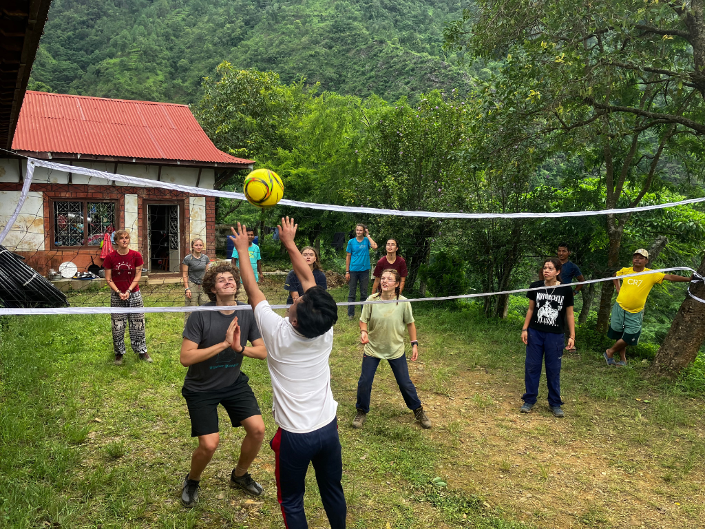 students playing volleyball