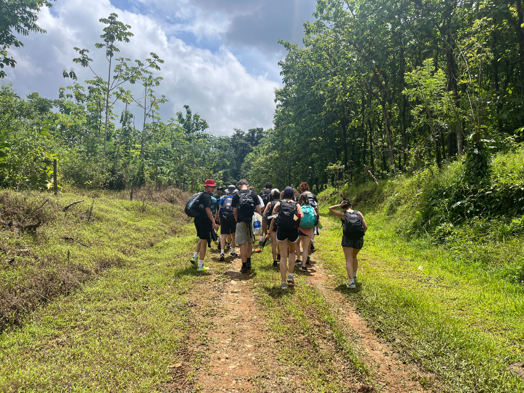 students hiking to rainforest adventure center
