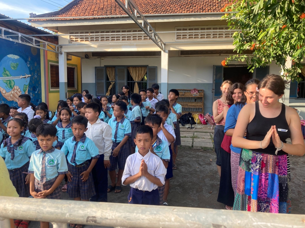 Students doing community service project at a local school in Thailand