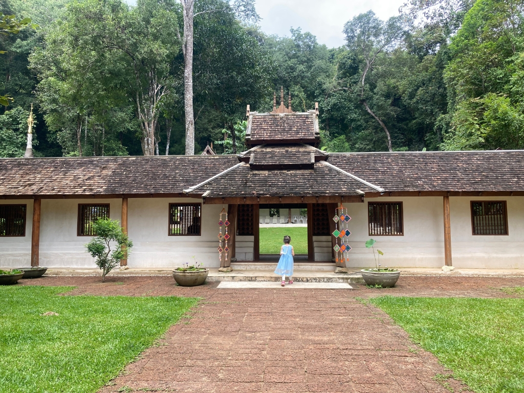 Girl walking into temple