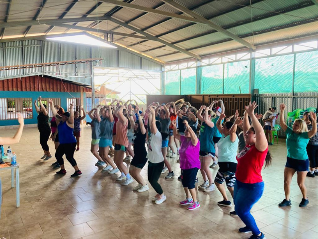 practicing dance and movement in the community center