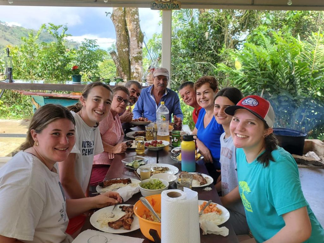 students eating all together in open air
