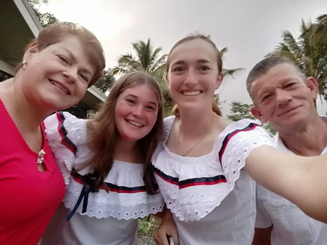 host family with decorative blouses