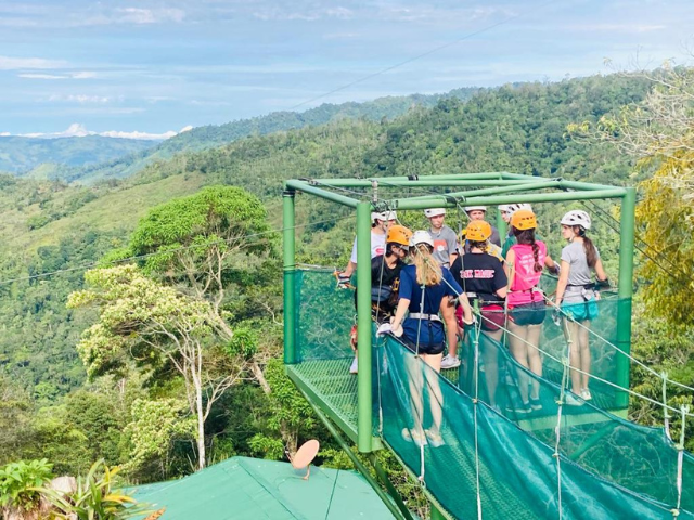 ziplining platform in costa rica students standing waiting