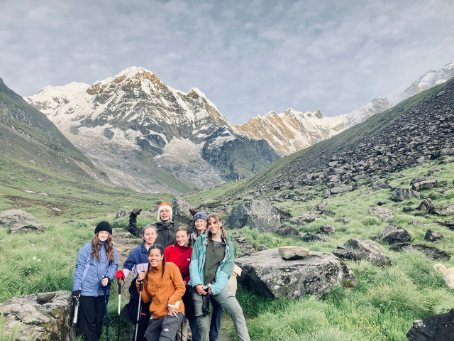 reaching a beautiful view on their trek