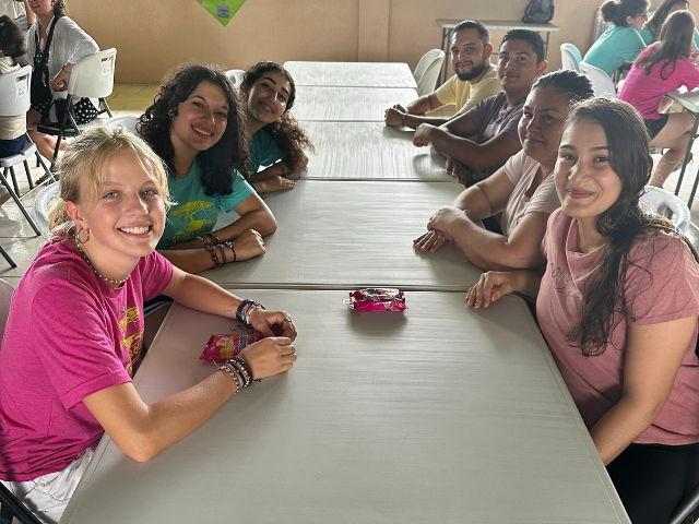 meeting host families pink shirt