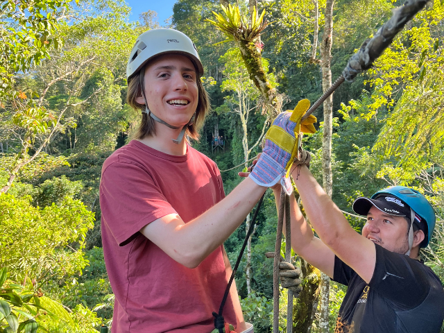 ziplining preparation red shirt