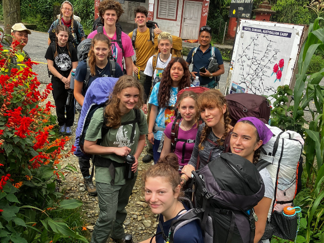 student treking outdoor backpacks