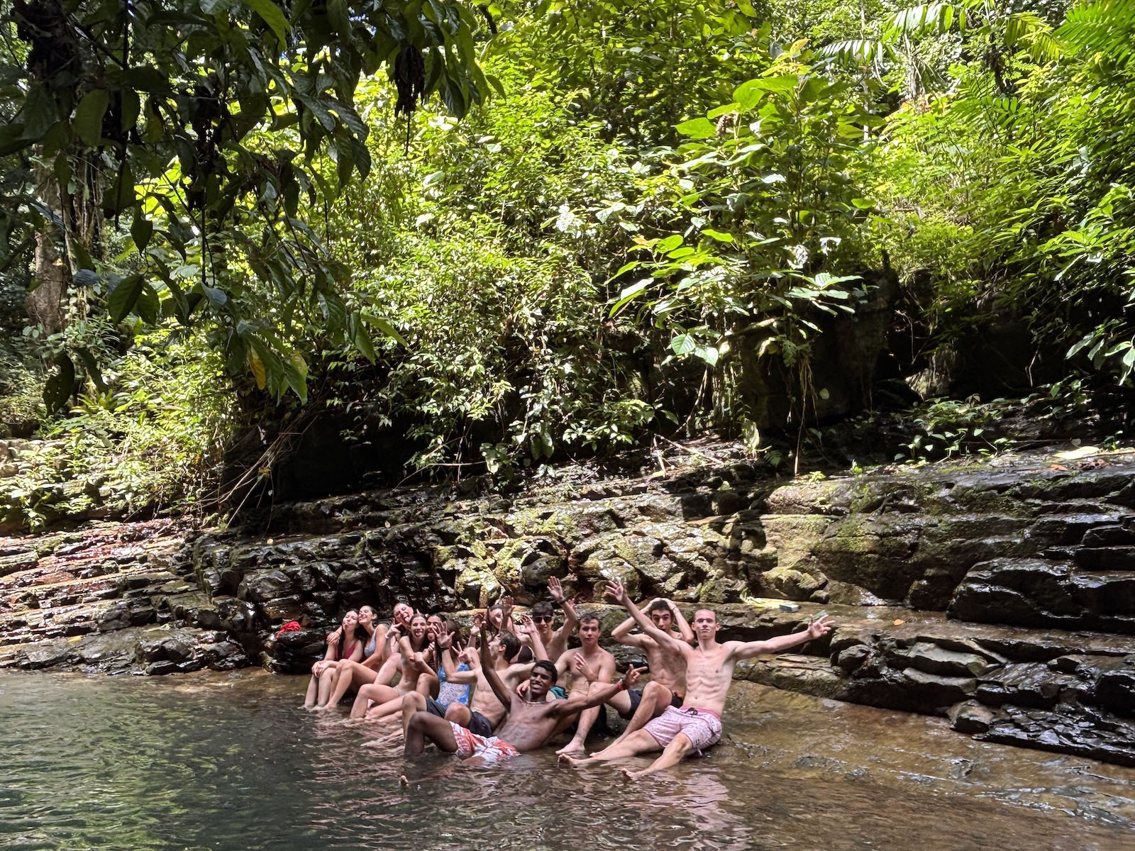 The whole group at the waterfall